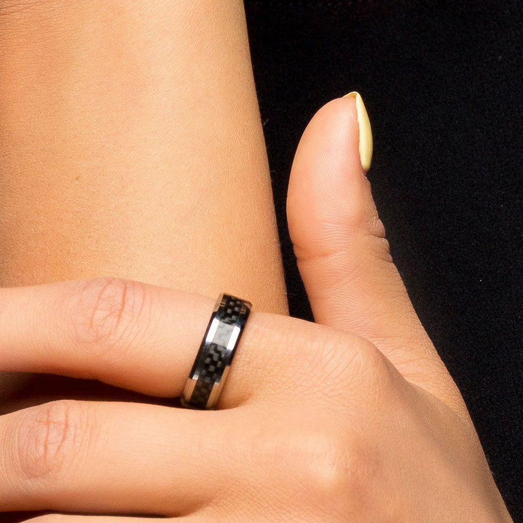 Black Carbon Fiber Inlay on Silver Tungsten Ring on Finger