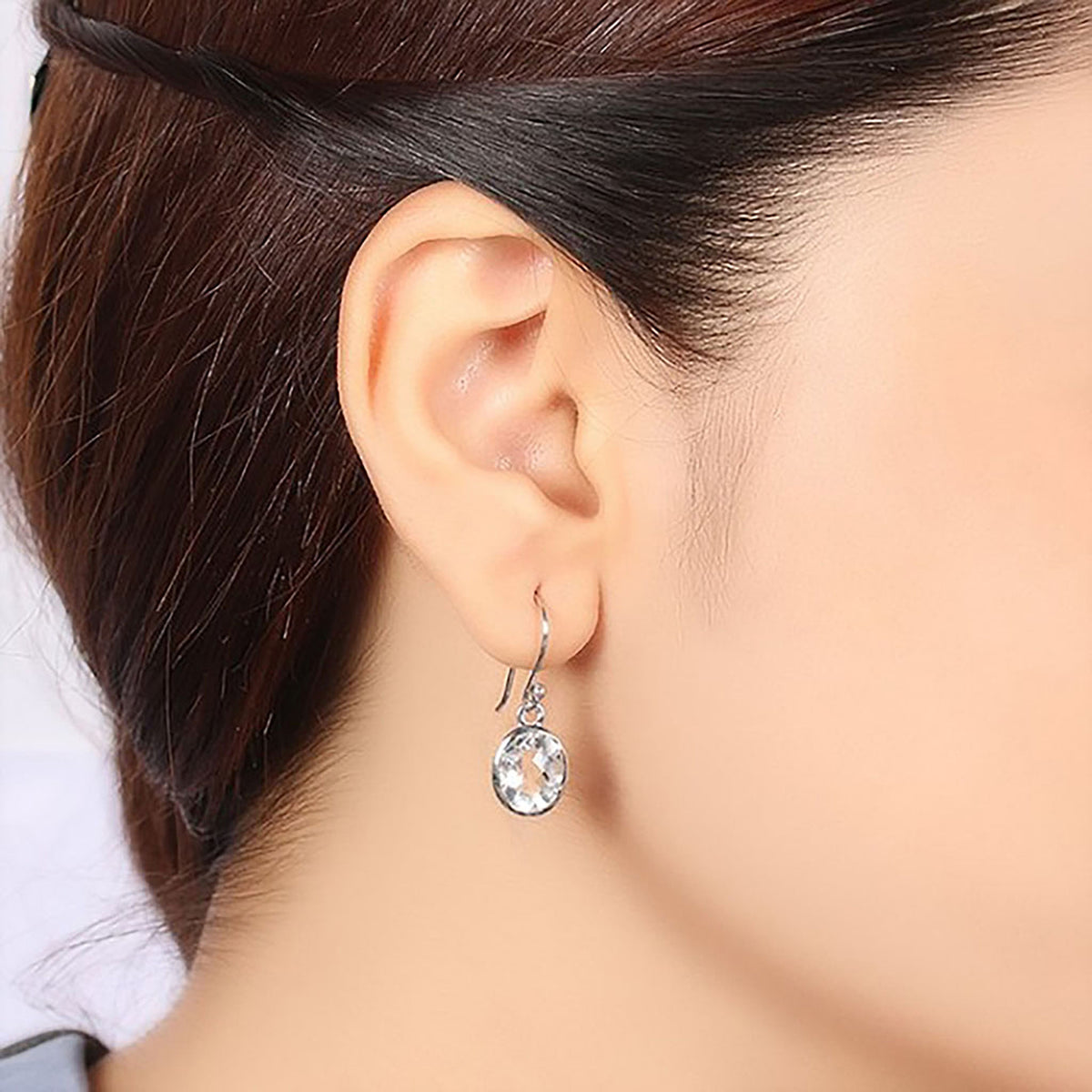 Clear Topaz Stone Earrings On Ear