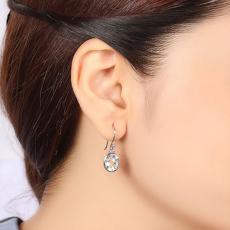 Clear Topaz Stone Earrings On Ear