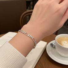 Figaro Chain Bracelet - 5.5mm on Women's Wrist