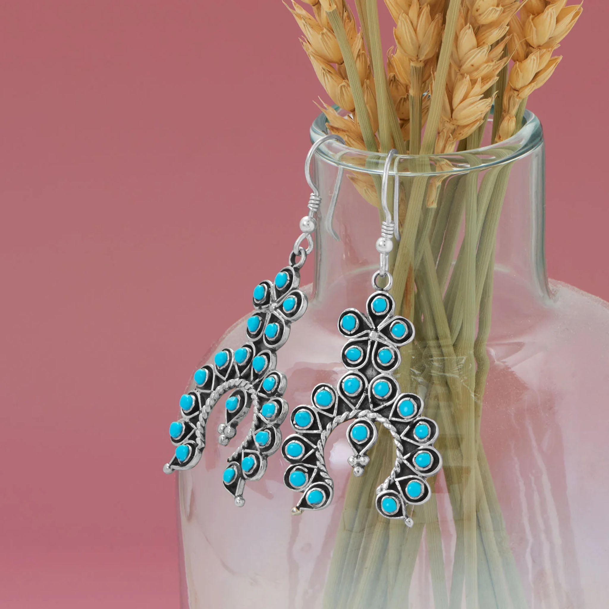 Horseshoe with Flower Design Turquoise Earrings Display