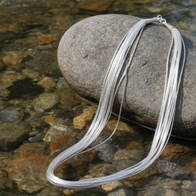 Liquid Silver 10 Strand Chain Laid Out Example