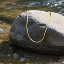 Snake Chain Gold - 2mm on Rock and Water Example