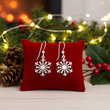 Snowflake Drop Earrings on Pillow Display